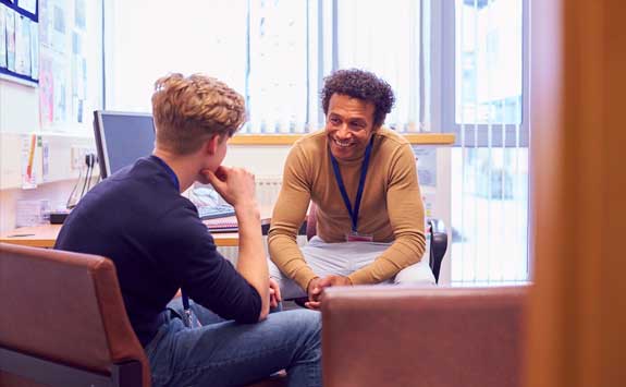 Teacher and student talking